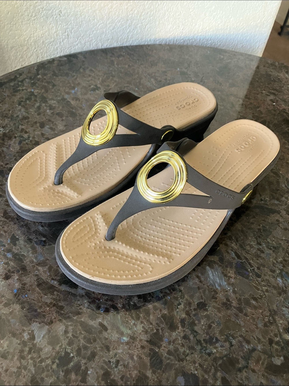 CROCS Women's Brown Flip Flops with Beige Footbed and Gold Ring